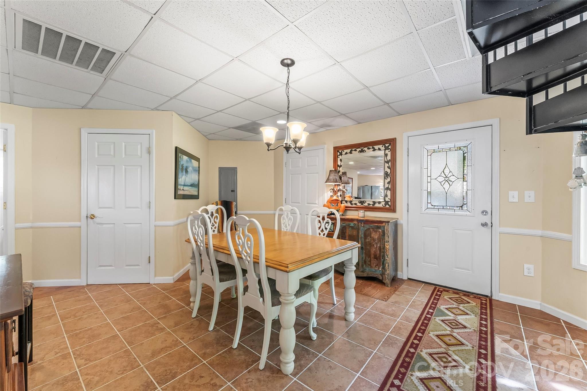 214 Locust Cove Road Marion, NC 28752 - Photo 22 of 47 a dining room with furniture and window