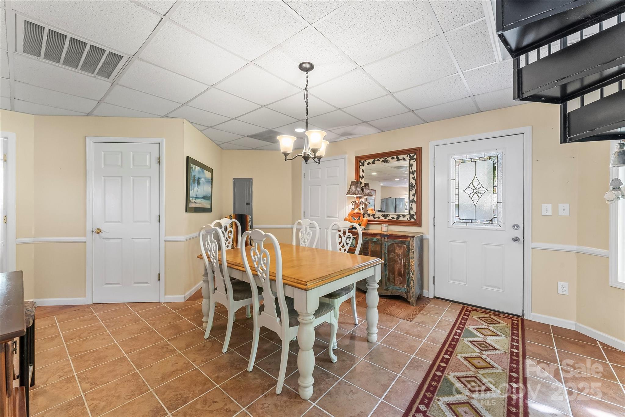214 Locust Cove Road Marion, NC 28752 - Photo 23 of 47 a dining room with furniture and window