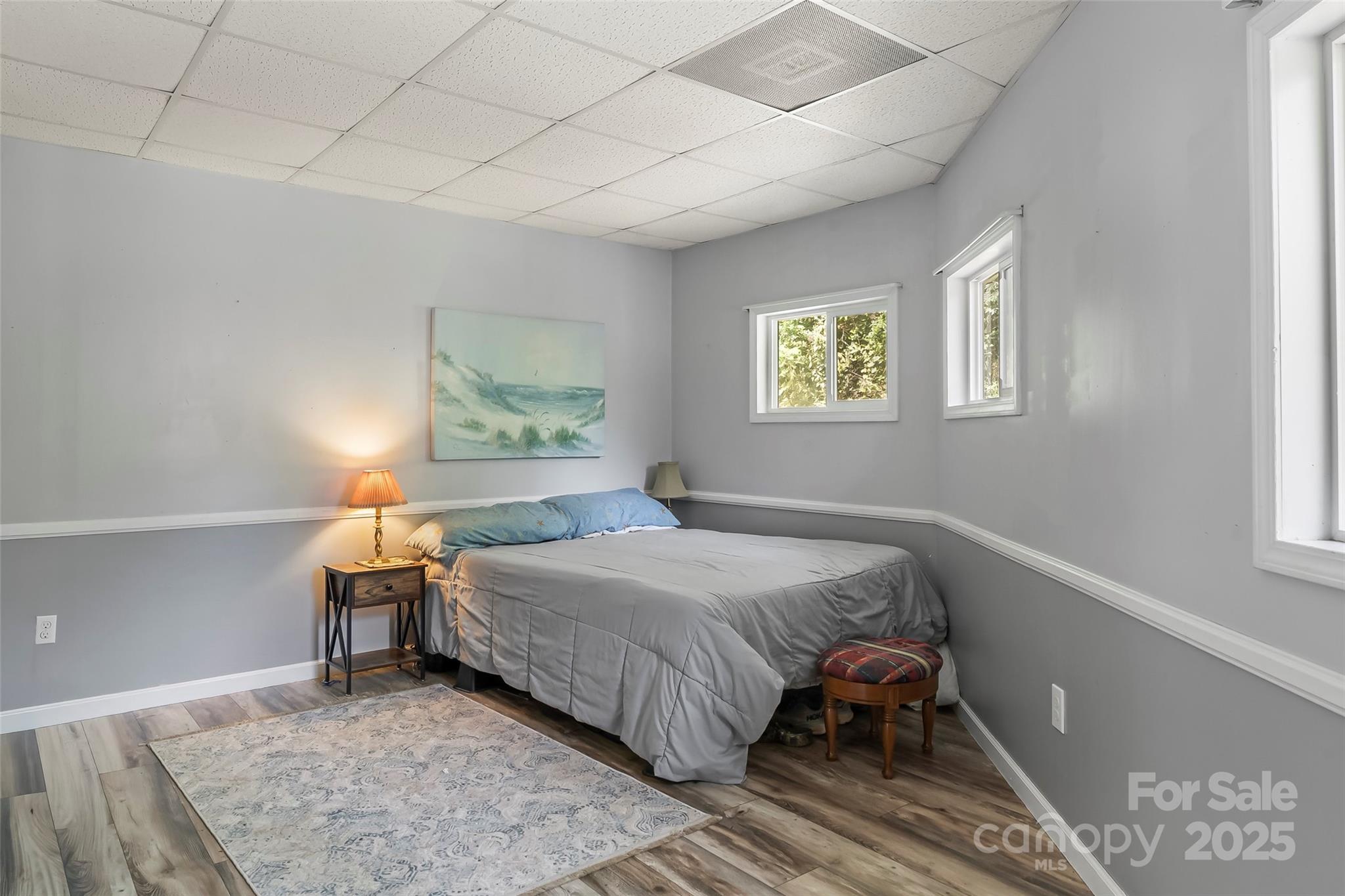 214 Locust Cove Road Marion, NC 28752 - Photo 29 of 47 a bedroom with a bed and window