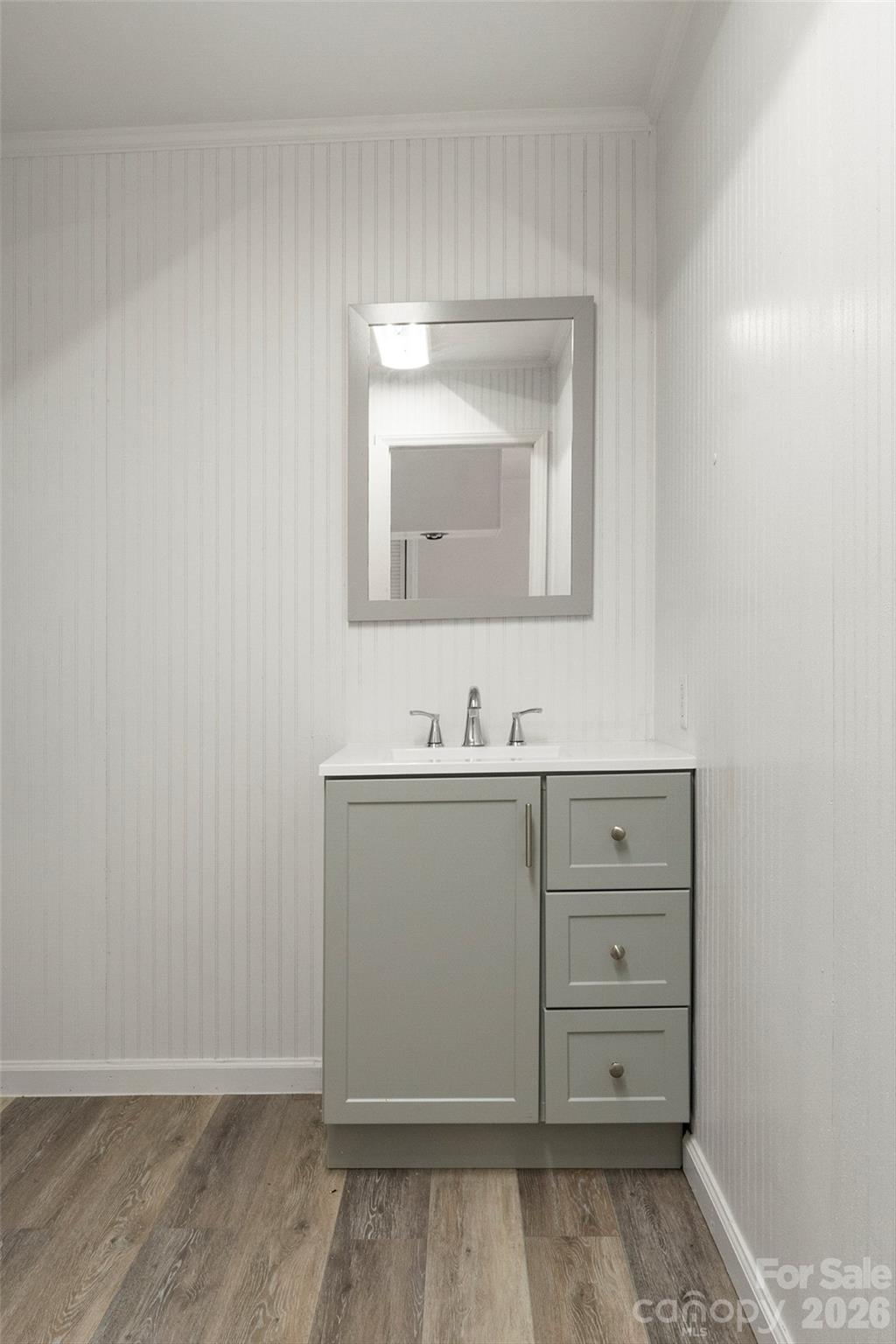 214 Locust Cove Road Marion, NC 28752 - Photo 40 of 47 a bathroom with a toilet sink and mirror