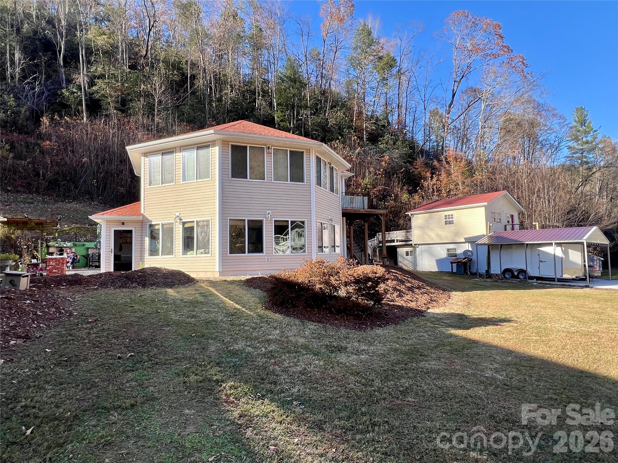 214 Locust Cove Road Marion, NC 28752 - Photo 5 of 47 a view of house and outdoor space