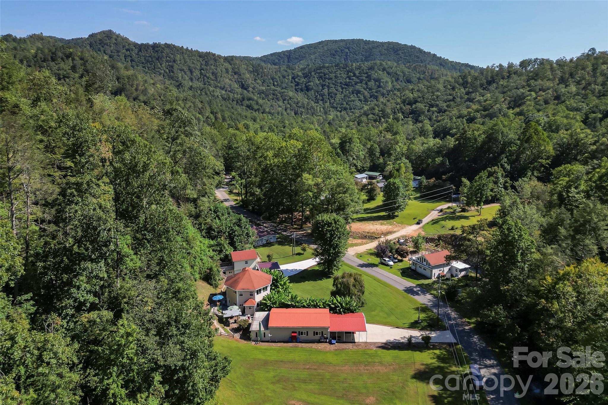 214 Locust Cove Road Marion, NC 28752 - Photo 10 of 47 an aerial view of a house