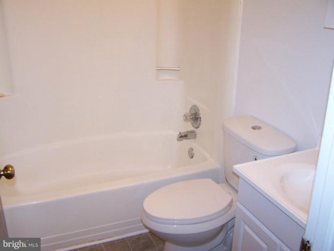 348 Valley Mill Road Winchester, VA 22602 - Photo 3 of 11 a bathroom with a toilet and a bathtub