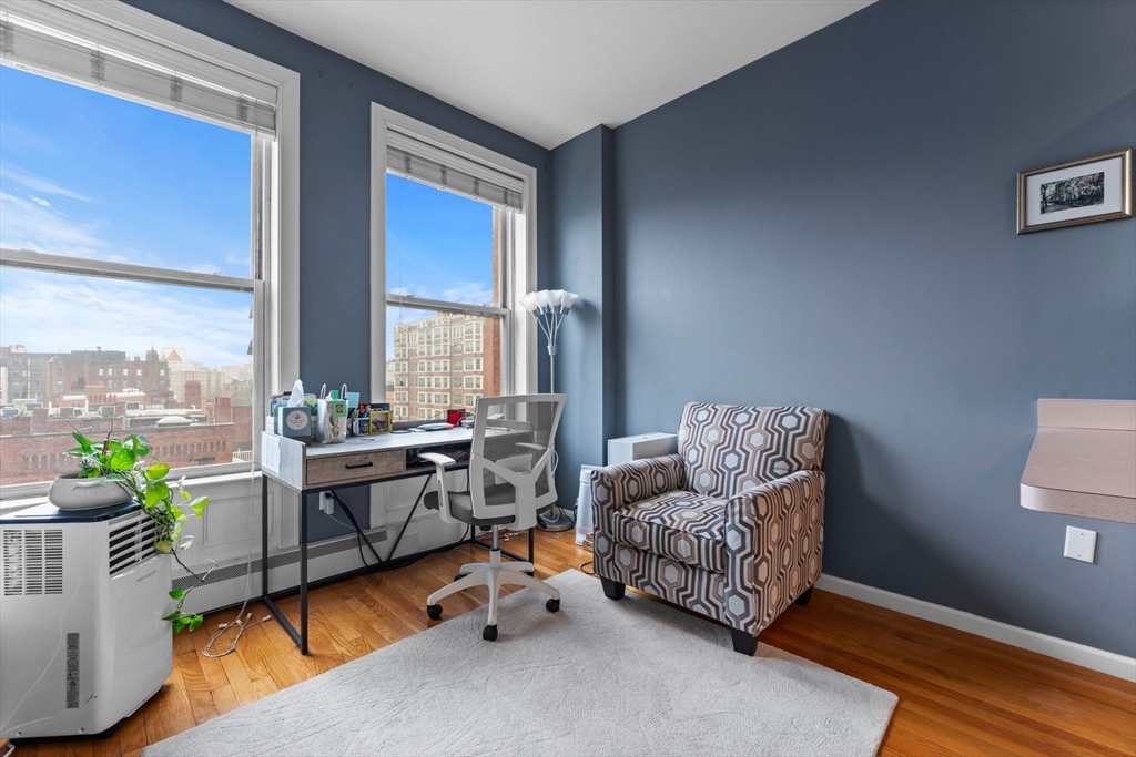 483 Beacon Street, Unit 63 Boston, MA 02115 - Photo 2 of 10 a living room with furniture and a window