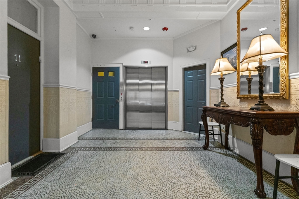 483 Beacon Street, Unit 63 Boston, MA 02115 - Photo 7 of 10 a view of lobby with livingroom