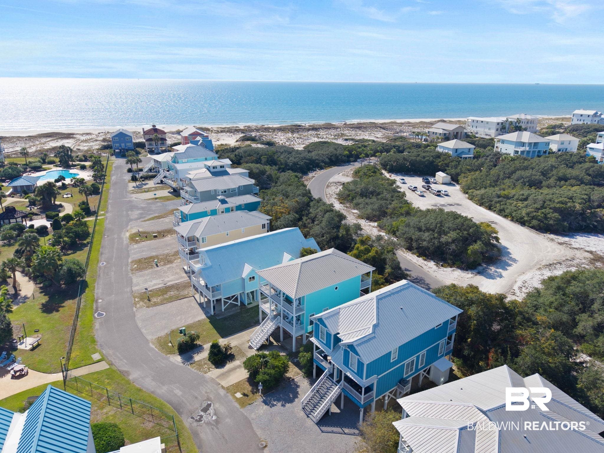 545 Plantation Road, Unit 3 Gulf Shores, AL 36542 - Photo 53 of 54 Aerial view of residential area with a large body of water