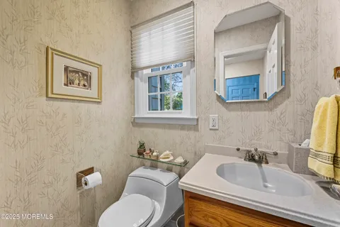 a bathroom with a sink and a toilet