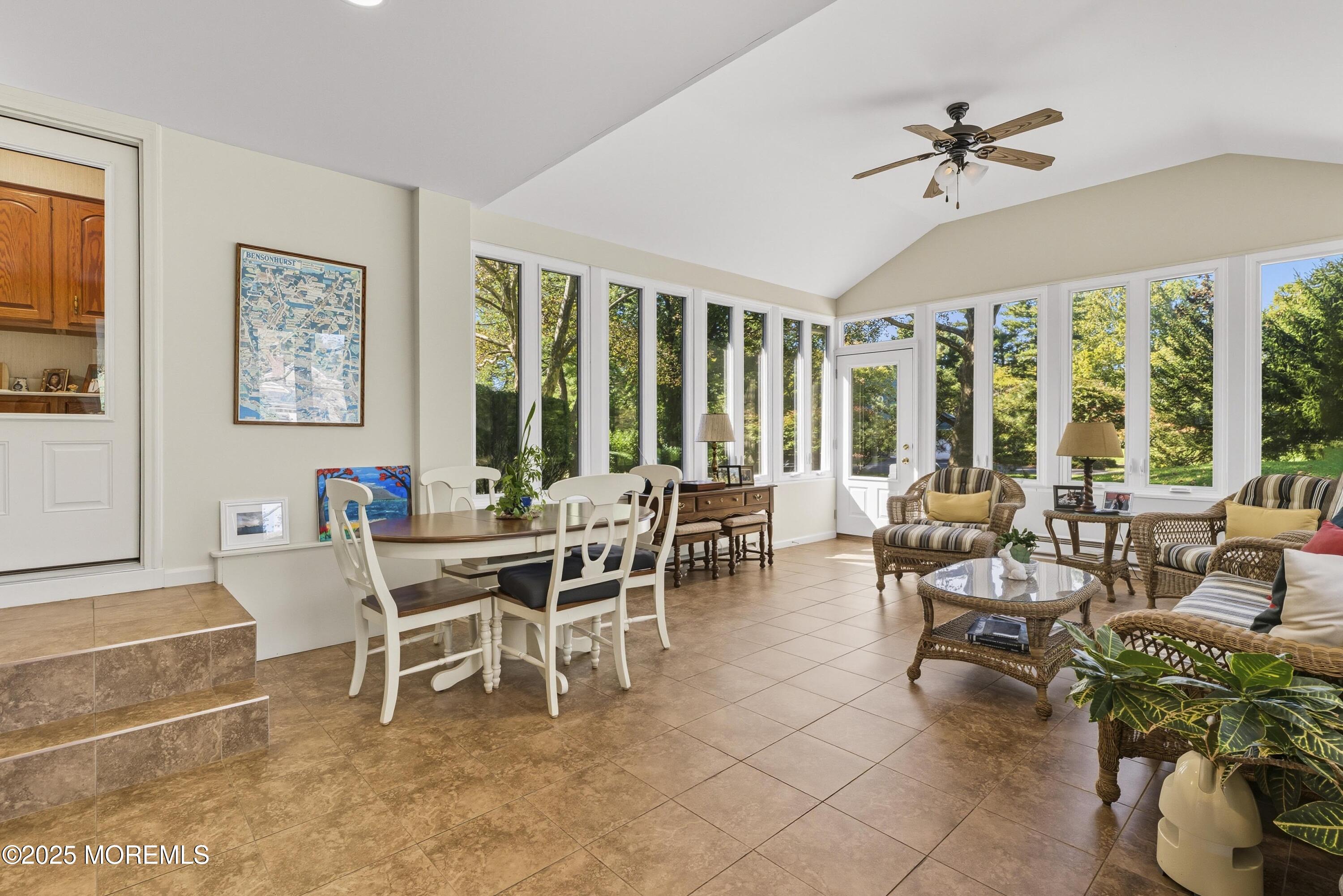 9 Mulberry Lane Colts Neck, NJ 07722 - Photo 14 of 36 a dining room with furniture a large window and a rug