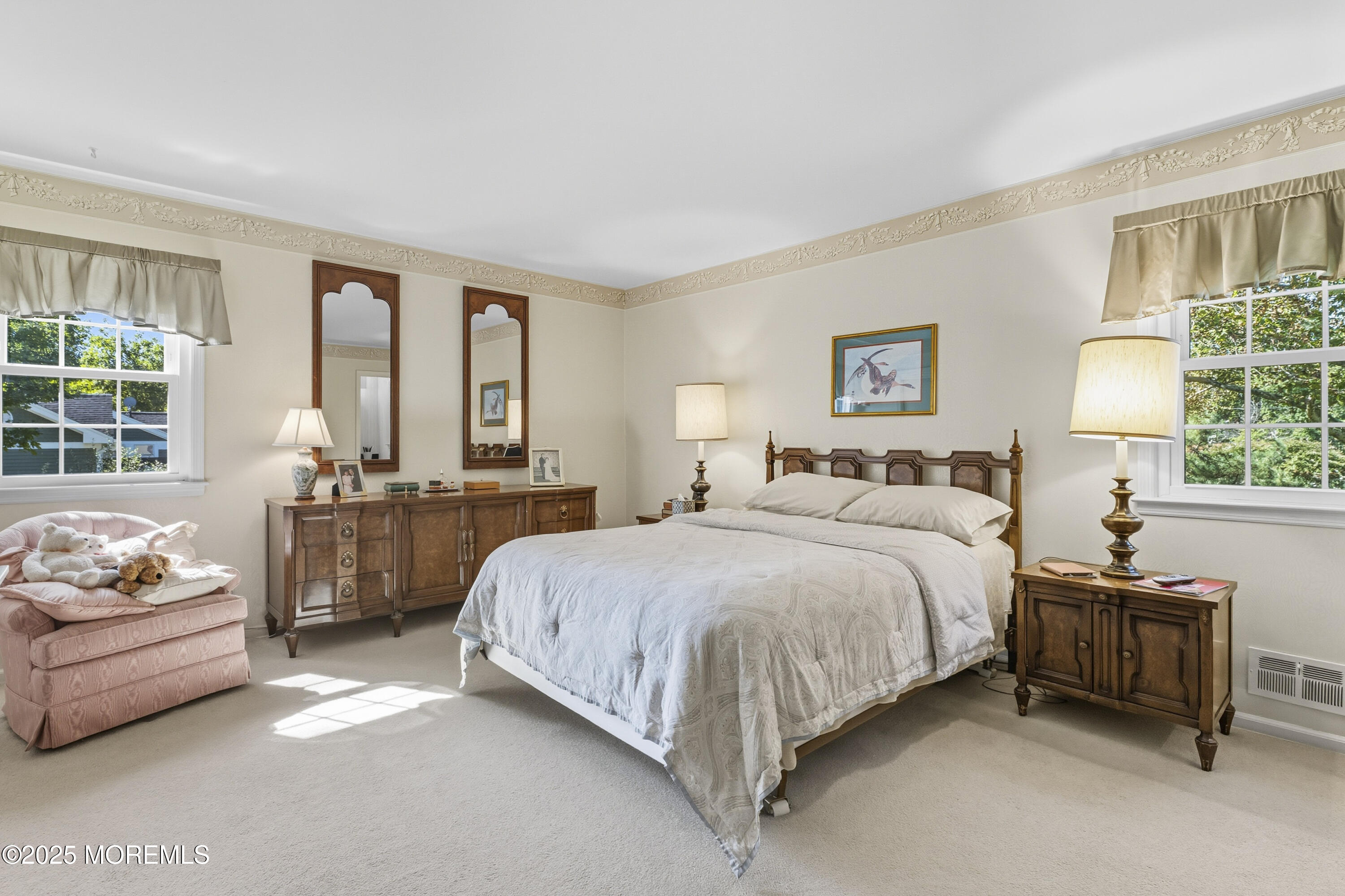 9 Mulberry Lane Colts Neck, NJ 07722 - Photo 17 of 36 a spacious bedroom with a bed and a couch