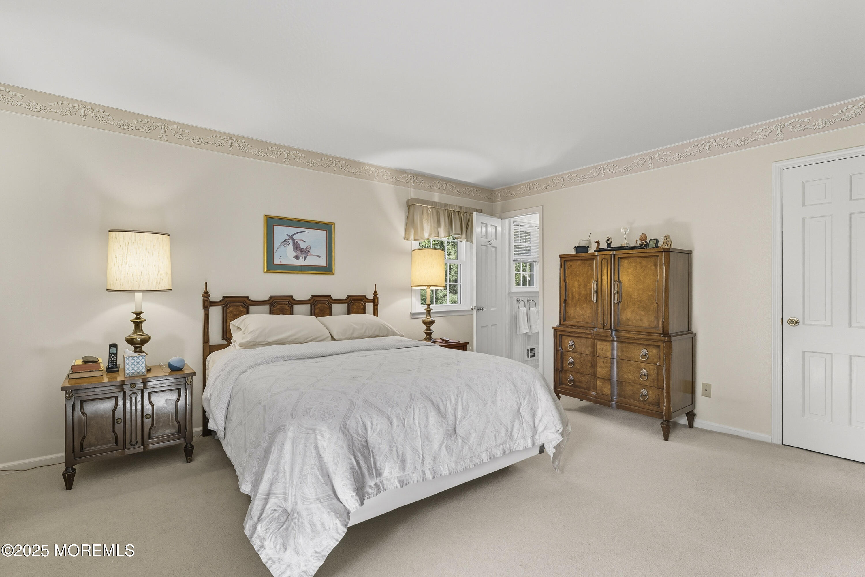 9 Mulberry Lane Colts Neck, NJ 07722 - Photo 18 of 36 a bedroom with a bed and a lamp