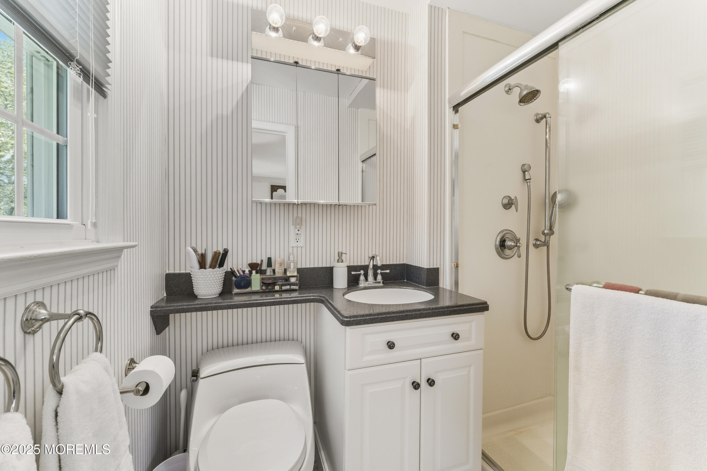 9 Mulberry Lane Colts Neck, NJ 07722 - Photo 19 of 36 a bathroom with a sink toilet and shower