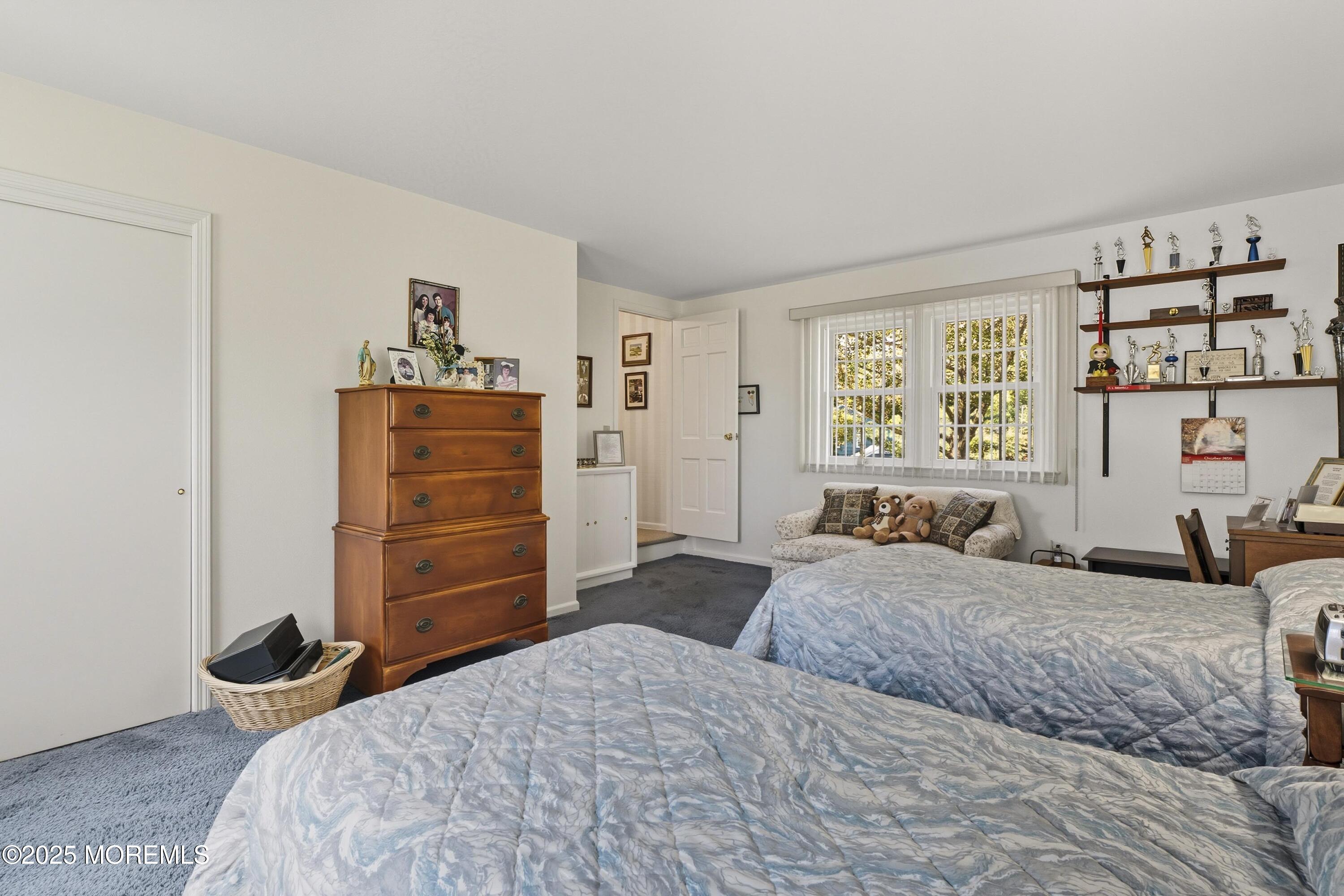 9 Mulberry Lane Colts Neck, NJ 07722 - Photo 21 of 36 a bedroom with a bed and a window