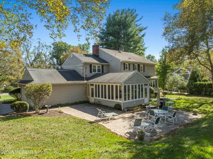 front view of a house with a garden