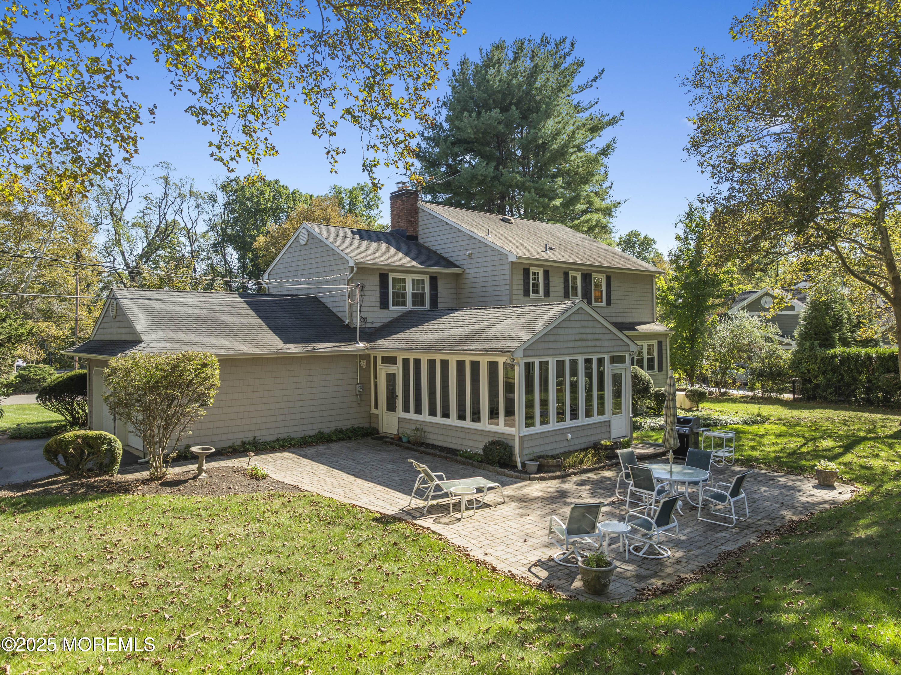 9 Mulberry Lane Colts Neck, NJ 07722 - Photo 28 of 36 front view of a house with a garden