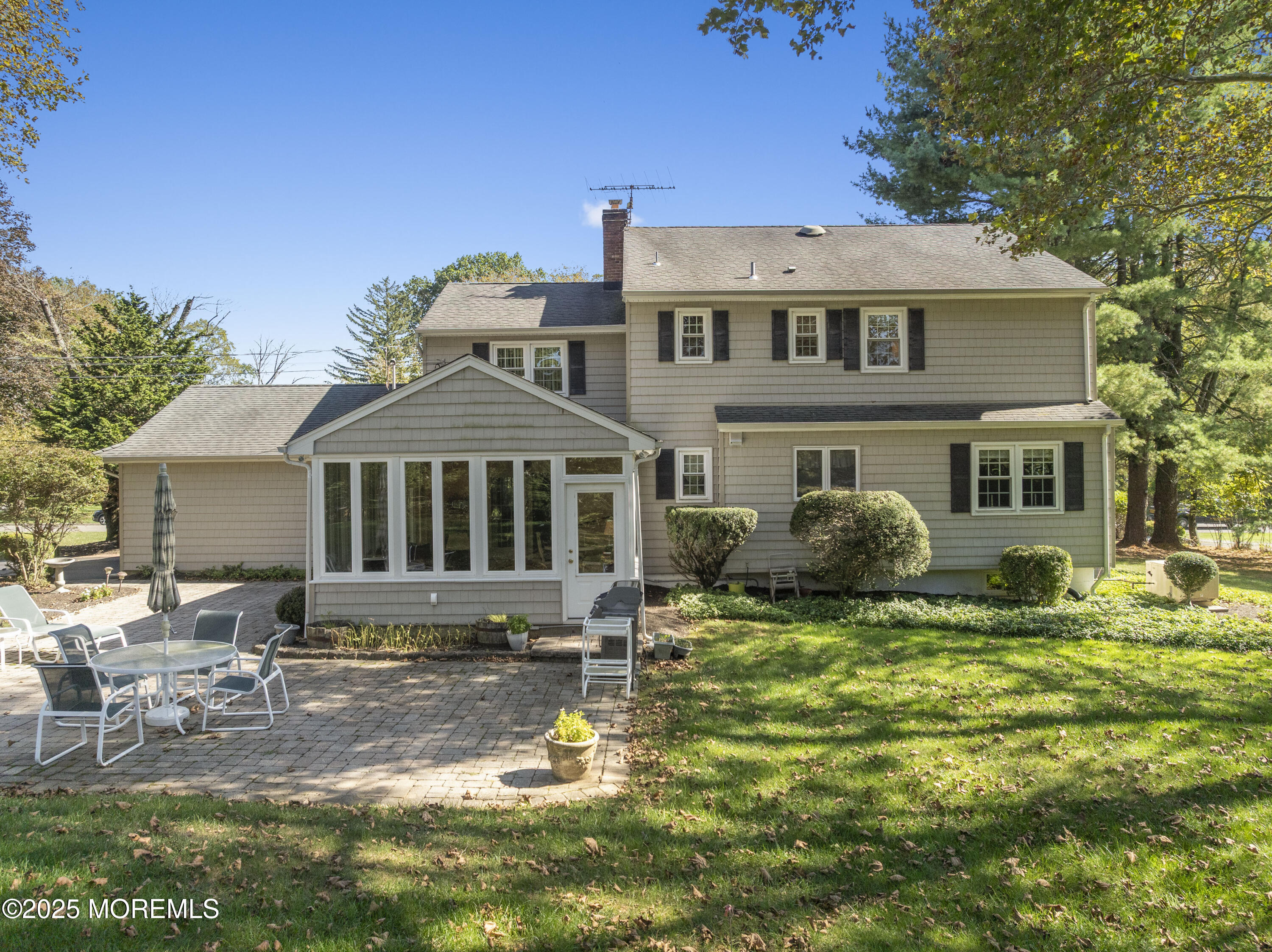 9 Mulberry Lane Colts Neck, NJ 07722 - Photo 29 of 36 a front view of a house with a yard