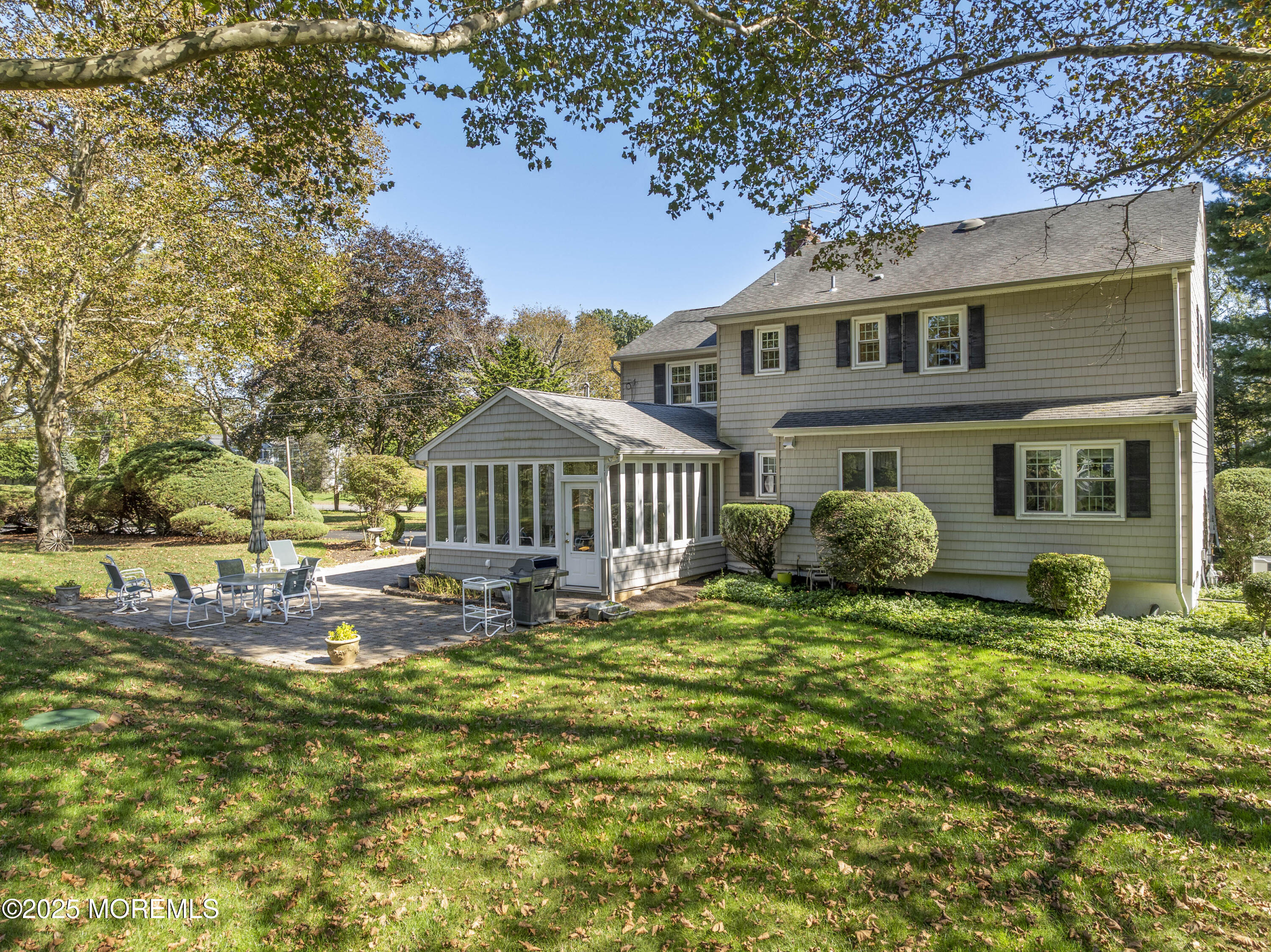 9 Mulberry Lane Colts Neck, NJ 07722 - Photo 30 of 36 a front view of a house with garden