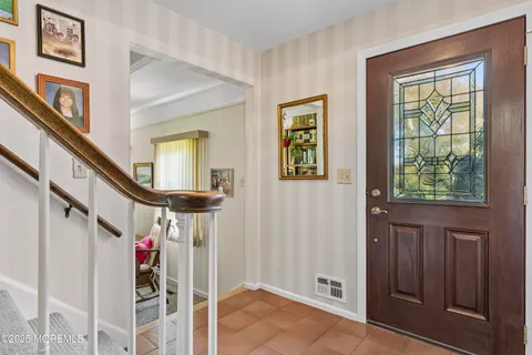a view of livingroom with furniture and windows