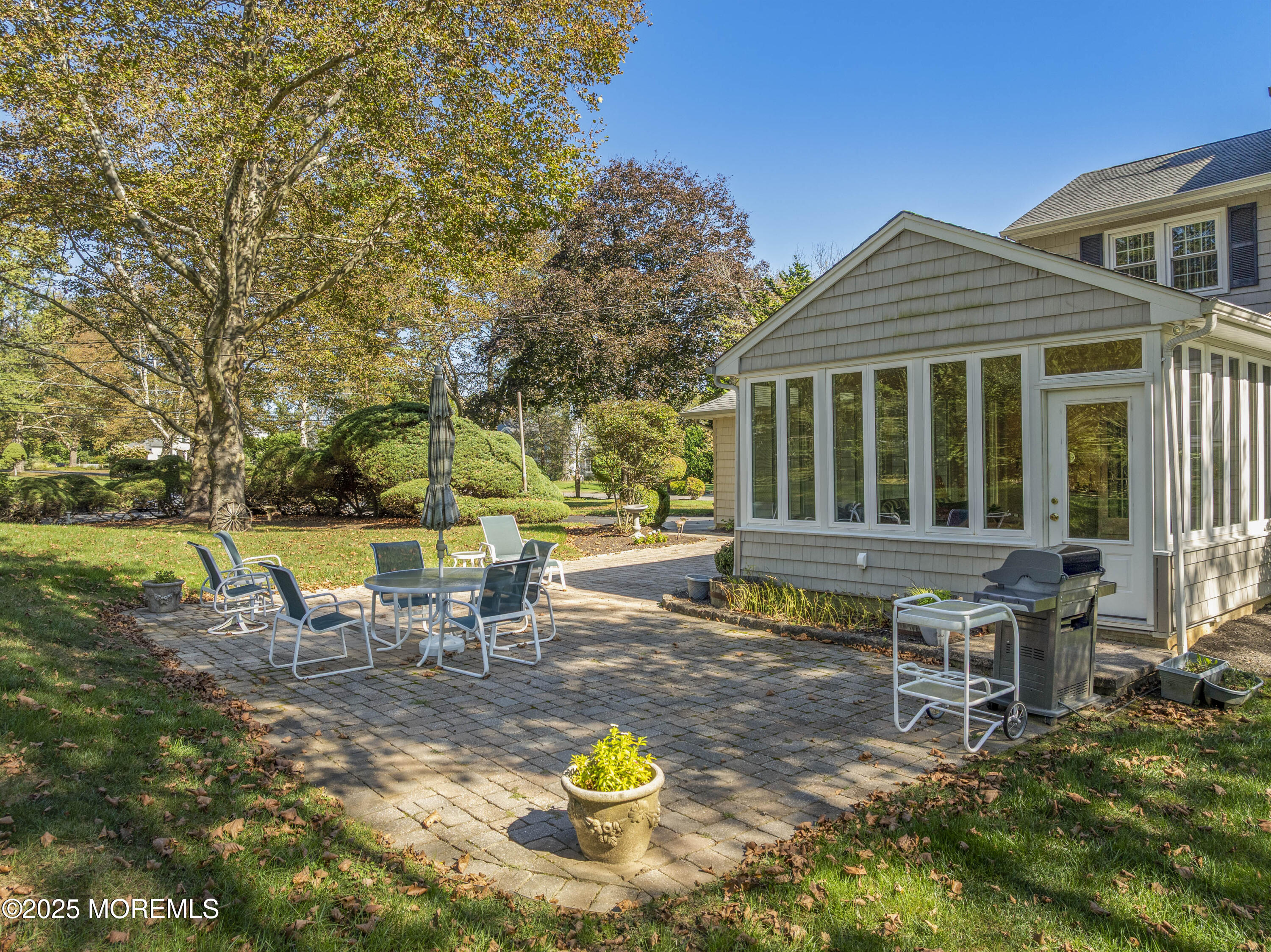 9 Mulberry Lane Colts Neck, NJ 07722 - Photo 31 of 36 a view of a house with backyard and sitting area
