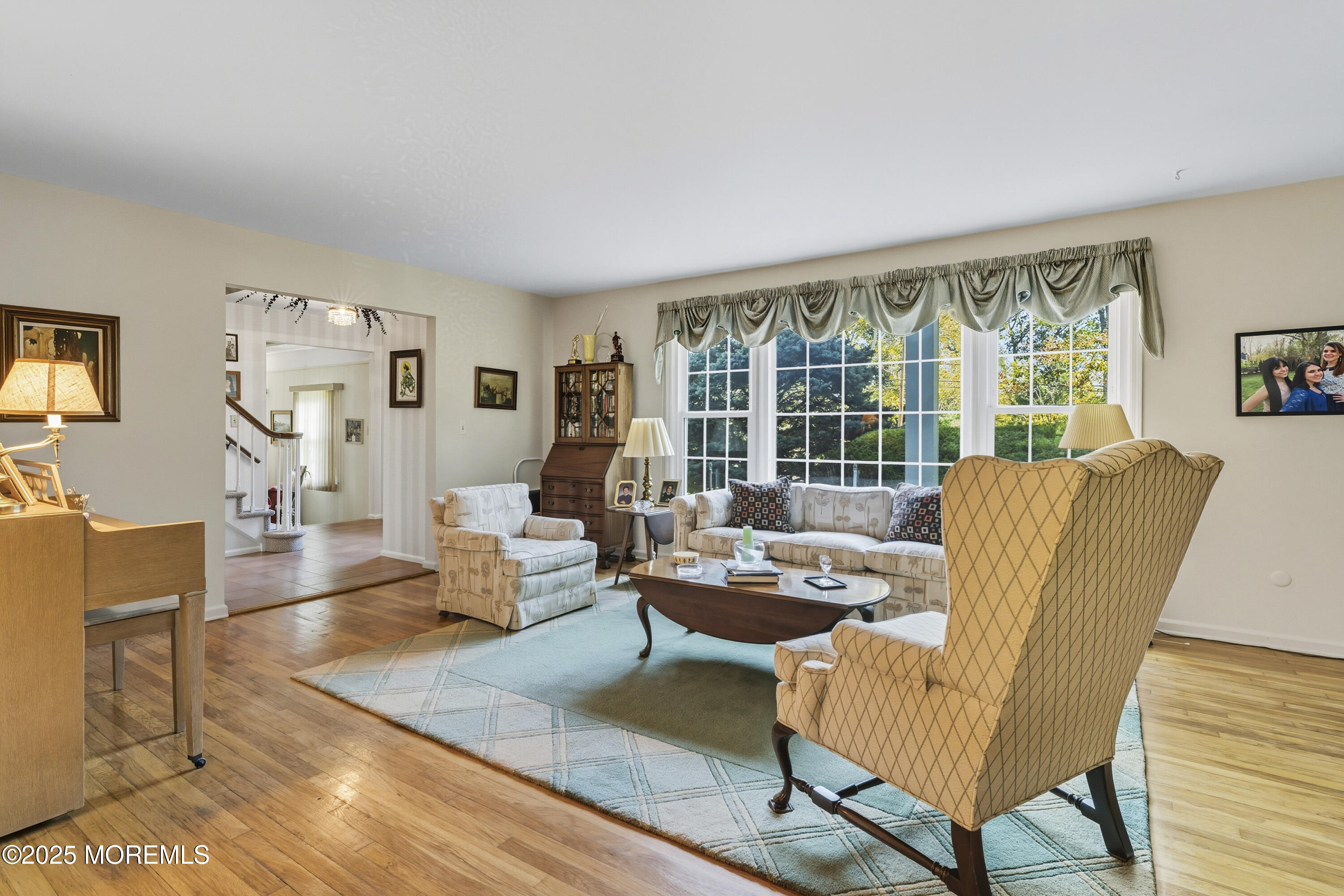 9 Mulberry Lane Colts Neck, NJ 07722 - Photo 5 of 36 a living room with furniture and a large window
