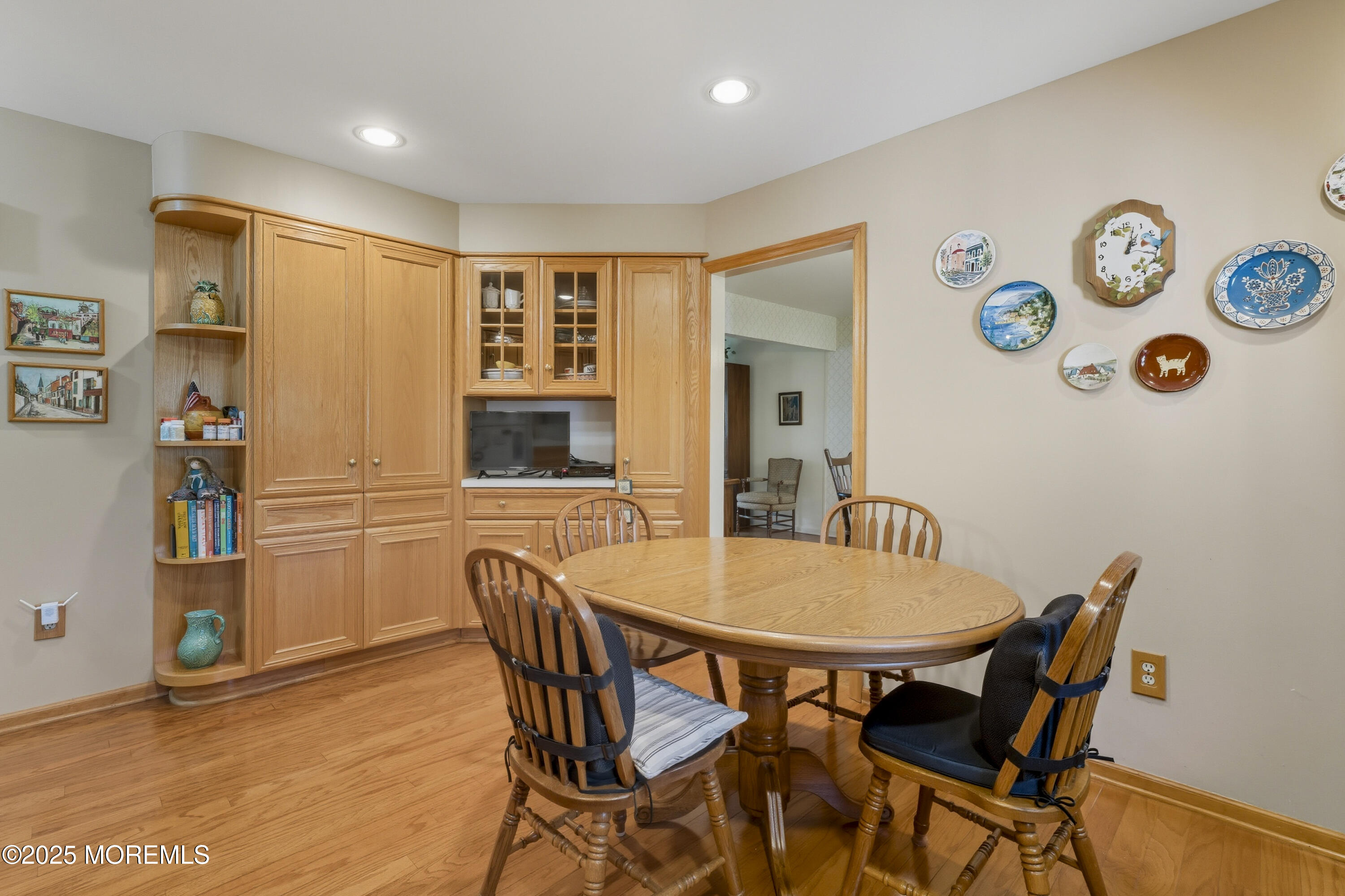9 Mulberry Lane Colts Neck, NJ 07722 - Photo 10 of 36 a view of a dining room with furniture and a kitchen