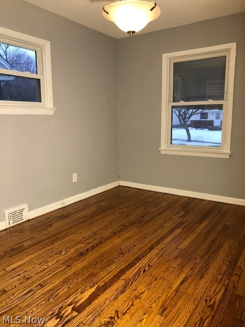 4125 Stonehaven Road Cleveland, OH 44121 - Photo 8 of 13 First floor front Bedroom, freshly painted, and refinished hardwood floors.