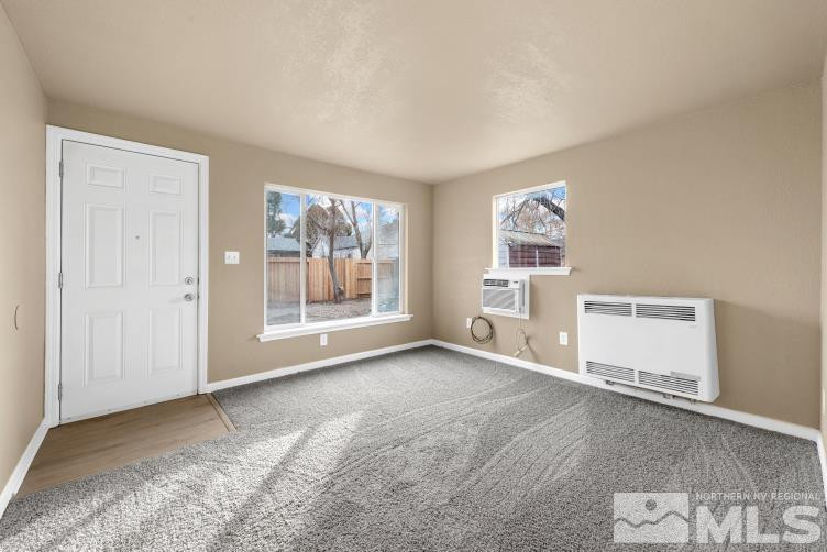 565 Colorado River Boulevard Reno, NV 89502 - Photo 12 of 25 an empty room with windows and cabinet