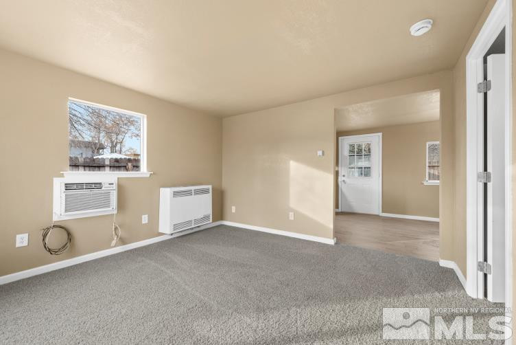 565 Colorado River Boulevard Reno, NV 89502 - Photo 13 of 25 an empty room with windows and closet