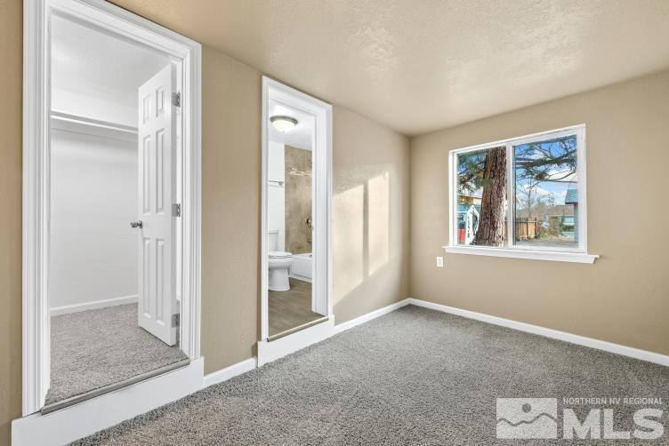 565 Colorado River Boulevard Reno, NV 89502 - Photo 18 of 25 a view of an empty room with window and closet area