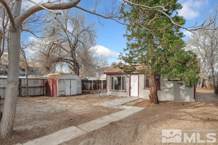 565 Colorado River Boulevard Reno, NV 89502 - Photo 19 of 25 a view of a house with a large tree