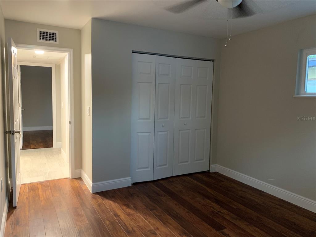 1742 8th Street Sarasota, FL 34236 - Photo 11 of 19 a view of a hallway with wooden floor