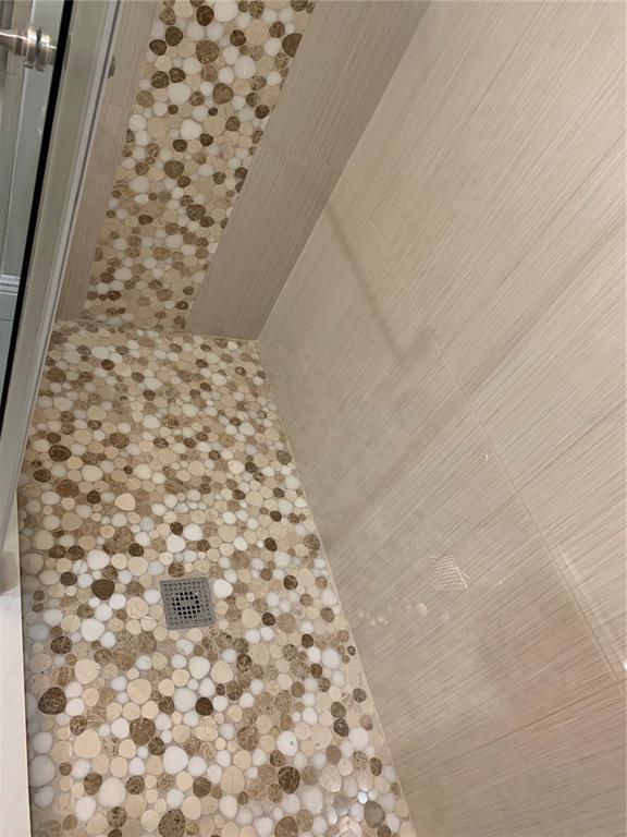 1742 8th Street Sarasota, FL 34236 - Photo 9 of 19 a bathroom with a bathtub and shower