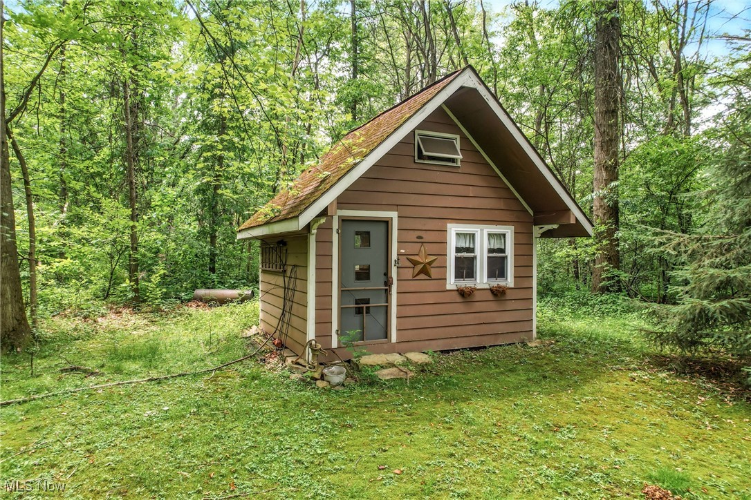 1681 State Road Northwest Warren, OH 44481 - Photo 13 of 50 Playhouse with loft
