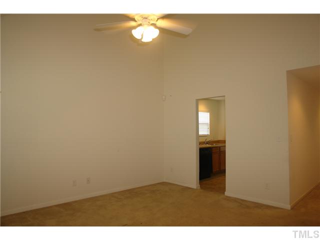 1508 Ricochet Drive Raleigh, NC 27610 - Photo 2 of 8 a view of empty room with wooden floor