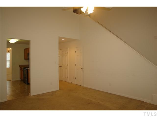 1508 Ricochet Drive Raleigh, NC 27610 - Photo 3 of 8 a view of an empty room and kitchen view