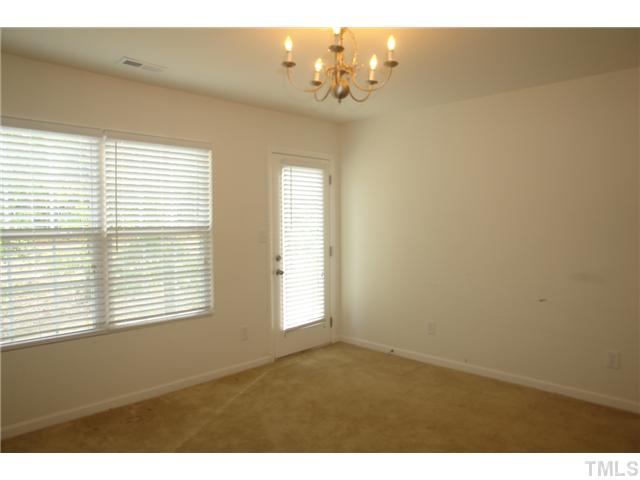 1508 Ricochet Drive Raleigh, NC 27610 - Photo 5 of 8 a view of empty room with window