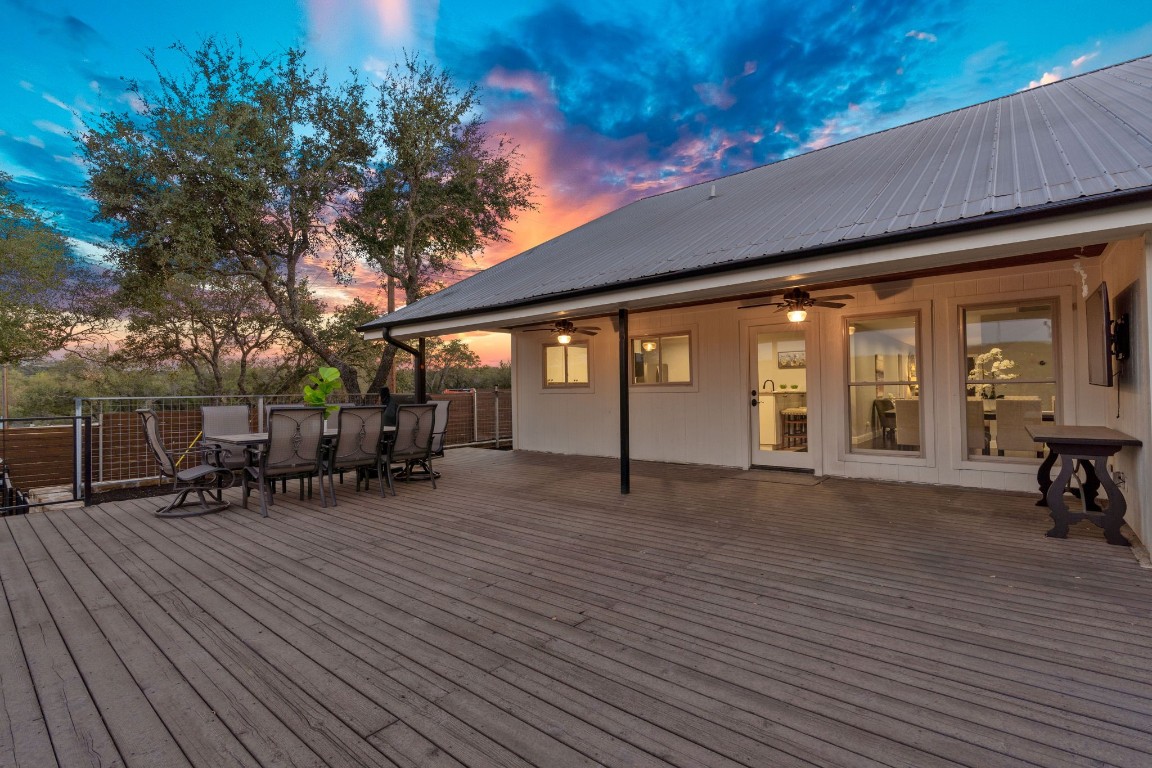 1325 Likeness Road Spicewood, TX 78669 - Photo 32 of 38 Large patio adjacent to kitchen; one of two patios and entertaining areas