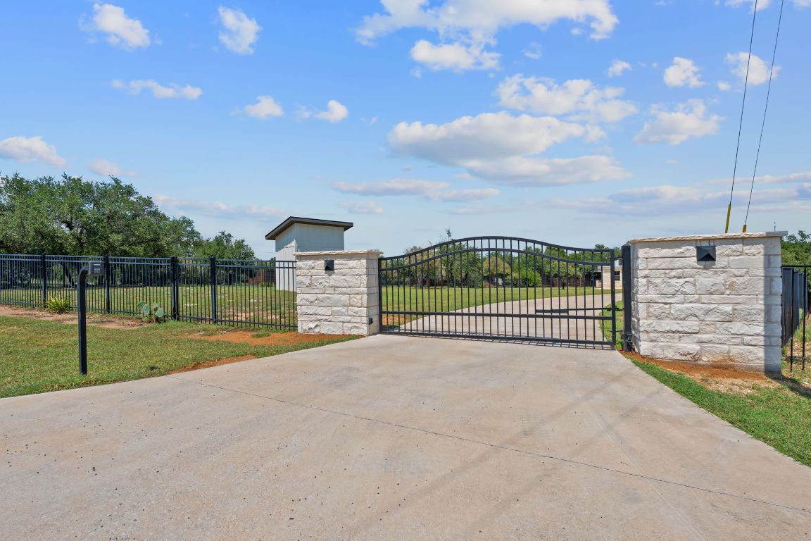 1325 Likeness Road Spicewood, TX 78669 - Photo 36 of 38 Controlled access property gate