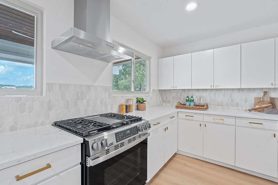 1325 Likeness Road Spicewood, TX 78669 - Photo 9 of 38 New Gas range and oven
