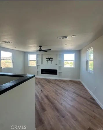 a view of an empty room and window