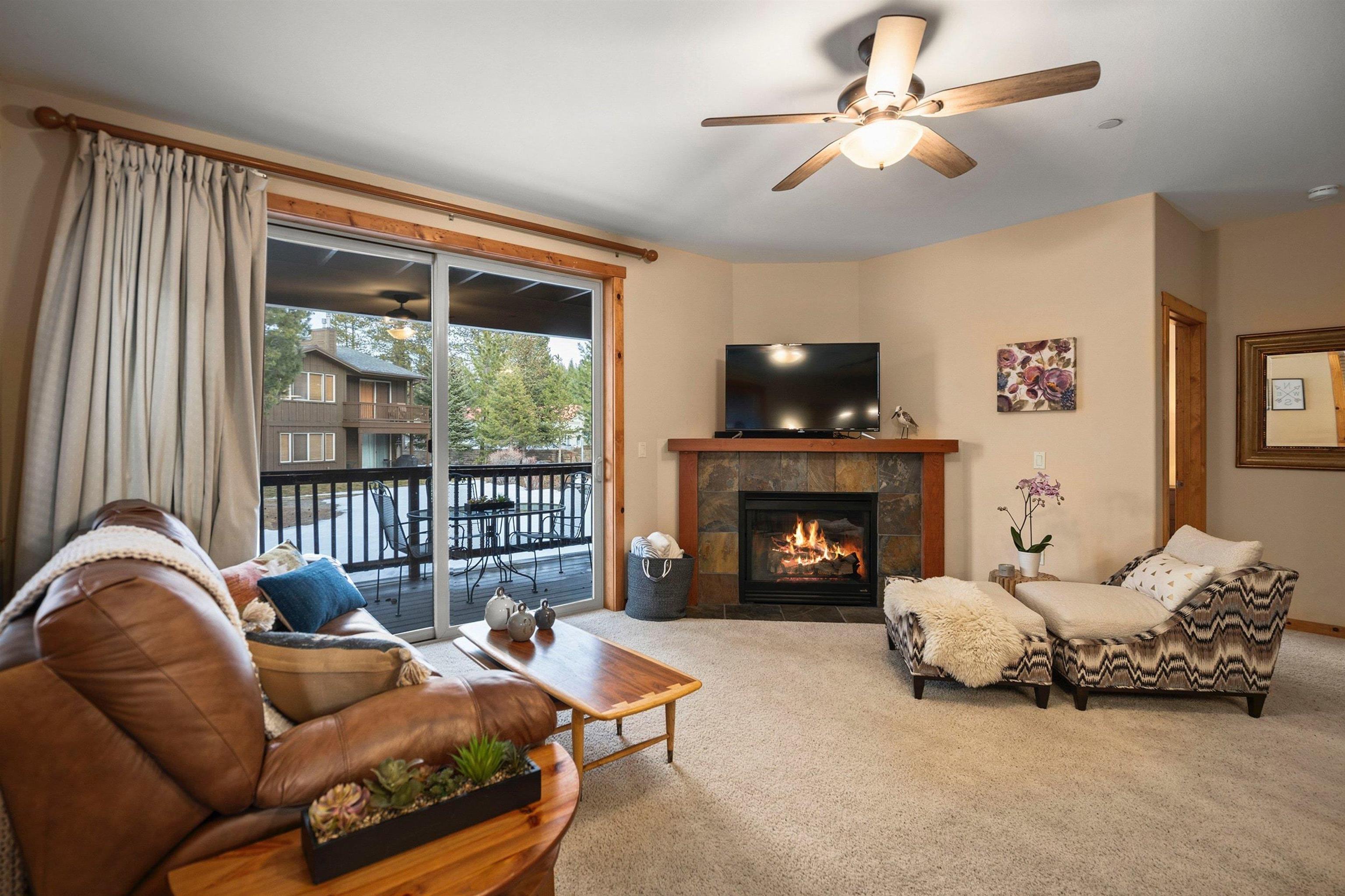 11420 Dolomite Way, Unit 1 Truckee, CA 96161 - Photo 3 of 28 a living room with furniture and a fireplace