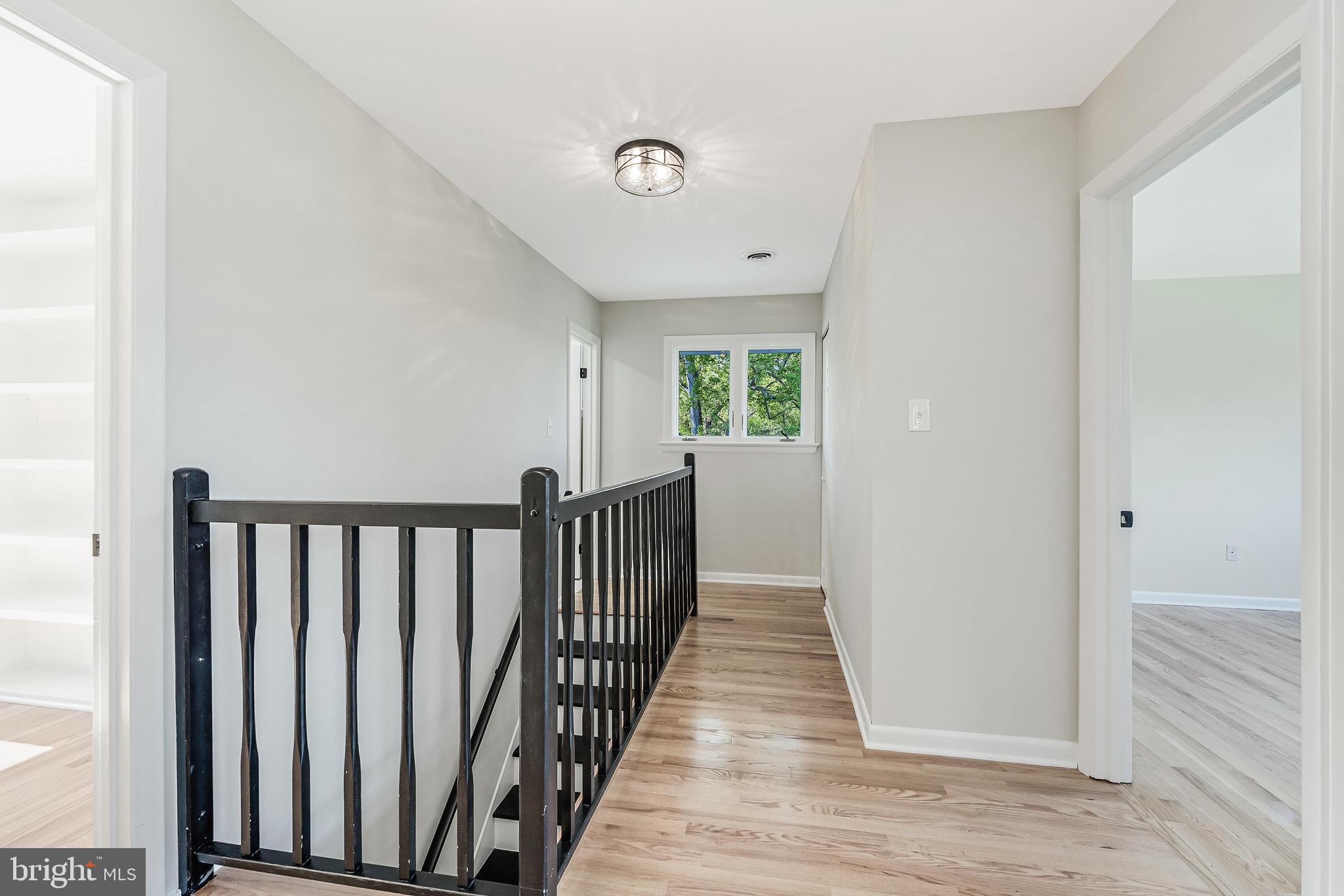 6891 Wilson Road Marshall, VA 20115 - Photo 76 of 118 Bright and airy hallway with charm.