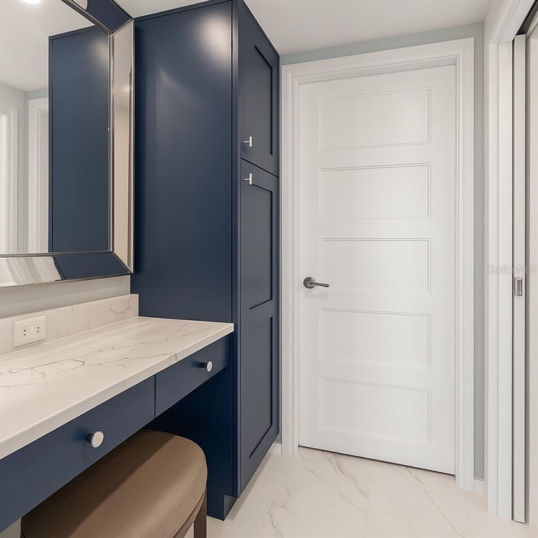 603 Longboat Club Road, Unit 1103N Longboat Key, FL 34228 - Photo 20 of 37 a bathroom with a sink a toilet and shower