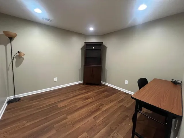a view of a room with an empty space