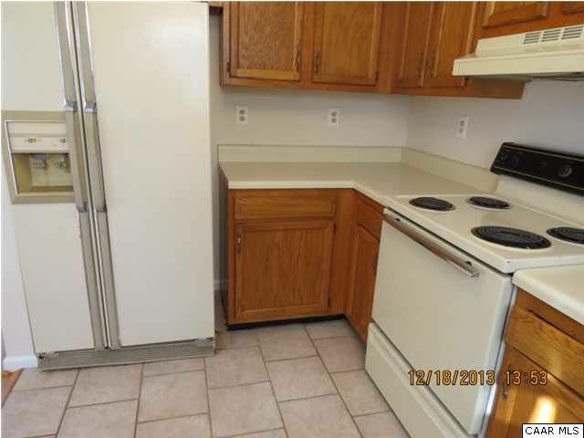 3934 Campbell Road Troy, VA 22974 - Photo 5 of 18 a kitchen with a stove and a cabinet