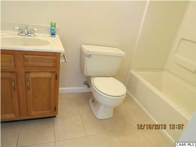 3934 Campbell Road Troy, VA 22974 - Photo 10 of 18 a bathroom with a sink a toilet and vanity