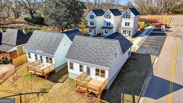 a black and white photo of a bench
