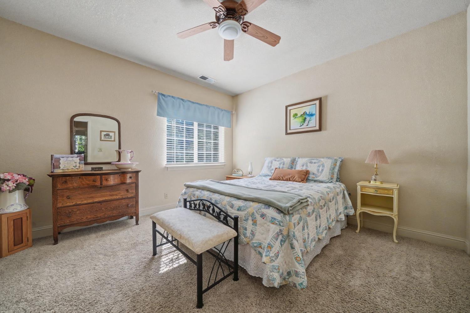16111 Pioneer Creek Road Pioneer, CA 95666 - Photo 31 of 59 a bedroom with a bed and a dresser