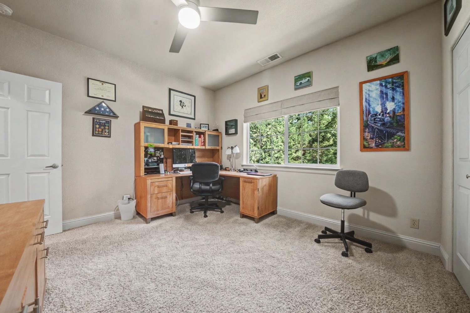 16111 Pioneer Creek Road Pioneer, CA 95666 - Photo 36 of 59 a view of a workspace with lounge chair and a window