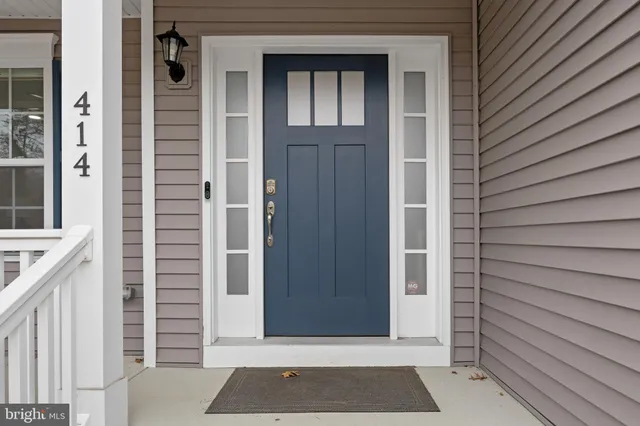a view of a chairs and table in a patio