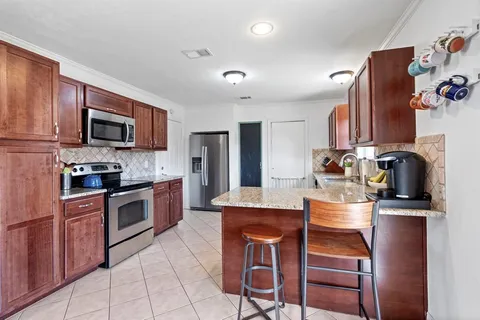 $385,000 | 2890 Meadow Port Drive, Farmers Branch, TX 75234